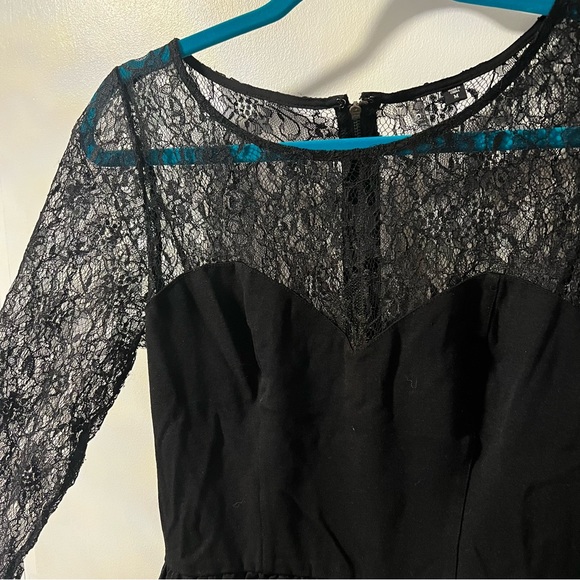 Guess Peplum Top With Lace and Zipper Back - Picture 2 of 8